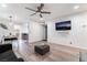 Open-concept living room with neutral tones and an adjacent dining area at 3120 S Eastern Ave # 5, Las Vegas, NV 89169