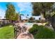 Resort style community pool with mature trees and a peaceful outdoor setting with lounge seating at 3120 S Eastern Ave # 5, Las Vegas, NV 89169