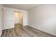 Bedroom with wood-look flooring, closet, and neutral walls, a serene retreat at 3151 Soaring Gulls Dr # 2002, Las Vegas, NV 89128