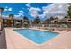 Enjoy the community pool surrounded by sun loungers and well-maintained grounds at 3151 Soaring Gulls Dr # 2002, Las Vegas, NV 89128