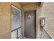 Inviting condo front door with a modern number plaque, secure entry, and adjacent window for natural light at 3151 Soaring Gulls Dr # 2002, Las Vegas, NV 89128