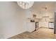 Bright kitchen with white cabinets, stainless steel appliances, and modern lighting at 3151 Soaring Gulls Dr # 2002, Las Vegas, NV 89128