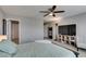 Cozy bedroom featuring a comfortable bed, TV, and soft lighting fixtures at 3166 Via Da Vinci, Henderson, NV 89044