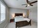 Inviting bedroom featuring a cozy bed, bedside lamps, and ample natural light at 3166 Via Da Vinci, Henderson, NV 89044