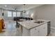 Kitchen island with a view of the dining and living area at 3166 Via Da Vinci, Henderson, NV 89044