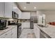 Spacious kitchen with granite countertops, stainless steel appliances, and ample cabinet space at 3166 Via Da Vinci, Henderson, NV 89044