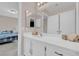 Bathroom vanity with white countertop, cabinet, and sleek fixtures for a modern look at 3186 Lapis Beach Dr, Las Vegas, NV 89117