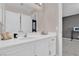 Bathroom vanity with white countertop, cabinet, and sleek fixtures for a modern look at 3186 Lapis Beach Dr, Las Vegas, NV 89117