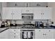 Modern kitchen features stainless steel appliances and white cabinets at 3186 Lapis Beach Dr, Las Vegas, NV 89117