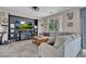 Comfortable living room with large sectional sofa and media center at 3186 Lapis Beach Dr, Las Vegas, NV 89117