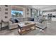 Spacious living room featuring tile floors and access to the outdoor living area at 3186 Lapis Beach Dr, Las Vegas, NV 89117