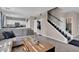 Spacious living room with view into the kitchen and stairway at 3186 Lapis Beach Dr, Las Vegas, NV 89117