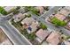 Birds eye view showcases community, solar panels, swimming pool, landscaping, and other outdoor amenities at 3217 Palladio Ave, North Las Vegas, NV 89031