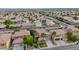 An aerial view of a desert residential neighborhood showcasing the property's location and mature landscaping at 3217 Palladio Ave, North Las Vegas, NV 89031