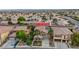An aerial view highlighting property address in a residential neighborhood with desert landscaping at 3217 Palladio Ave, North Las Vegas, NV 89031