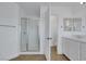 Bathroom featuring a glass enclosed shower, tile flooring, and white vanity at 3217 Palladio Ave, North Las Vegas, NV 89031