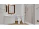 Clean bathroom featuring a shower, toilet, and vanity with white cabinetry and neutral countertops at 3217 Palladio Ave, North Las Vegas, NV 89031