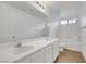 Bright bathroom with a double vanity, a toilet, and a shower-tub combination, offering great space at 3217 Palladio Ave, North Las Vegas, NV 89031