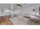 Spacious living room with hardwood floors, neutral-toned furnishings, and ample natural light at 3217 Palladio Ave, North Las Vegas, NV 89031
