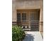 Ground-level entryway with security gate and window to the left of the front door at 3450 Erva St # 167, Las Vegas, NV 89117