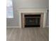 Living area showcasing a cozy fireplace with tile surround and decorative mantle at 3450 Erva St # 167, Las Vegas, NV 89117