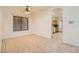 Sunny dining room with tile floors, ceiling fan and access to other areas in the home at 3525 Tuscany Village Dr, Las Vegas, NV 89129