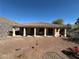 Large backyard with covered patio offering space for outdoor enjoyment and relaxation at 3567 Cottage Stream Ct, Laughlin, NV 89029
