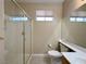 Bathroom with tile floors, shower, toilet and vanity with sink at 3567 Cottage Stream Ct, Laughlin, NV 89029