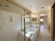 Bathroom featuring a tub and shower combo next to double sink vanities at 3567 Cottage Stream Ct, Laughlin, NV 89029