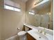 A well-lit bathroom featuring a stand-up shower and vanity at 3567 Cottage Stream Ct, Laughlin, NV 89029