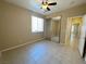 Spacious bedroom boasts a ceiling fan and sliding door closet with mirror at 3567 Cottage Stream Ct, Laughlin, NV 89029