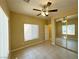 Bedroom showcasing mirrored closet doors, a window, and tile flooring at 3567 Cottage Stream Ct, Laughlin, NV 89029