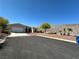 Attractive single-story home with desert landscaping and a two-car garage at 3567 Cottage Stream Ct, Laughlin, NV 89029