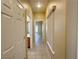 Hallway with tile flooring connecting bathroom and bedroom at 3567 Cottage Stream Ct, Laughlin, NV 89029