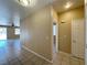 Bright living room features tile flooring and sliding door access to outdoor space at 3567 Cottage Stream Ct, Laughlin, NV 89029