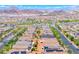 Breathtaking aerial shot of the community highlighting 358 Badinerie Street, showcasing the surrounding neighborhood and mountain views at 358 Badinerie St, Henderson, NV 89011