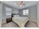 Cozy bedroom with a ceiling fan, carpet, and serene atmosphere at 358 Badinerie St, Henderson, NV 89011