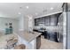Stylish kitchen with granite counters, stainless steel appliances, and island seating at 358 Badinerie St, Henderson, NV 89011