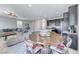 Open concept kitchen and living area provides ample room for entertaining at 358 Badinerie St, Henderson, NV 89011