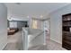Upstairs loft area with neutral walls, cozy seating, and easy access to rooms at 358 Badinerie St, Henderson, NV 89011