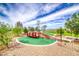 Community playground with colorful play structure at 358 Badinerie St, Henderson, NV 89011