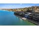 Stunning aerial view of the Lakefront home with breathtaking water and mountain views, and water access at 36 Lakefront Dr, Henderson, NV 89011