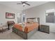 Comfortable bedroom featuring stylish decor, a cozy bed, and ample natural light at 36 Lakefront Dr, Henderson, NV 89011