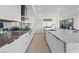 Modern kitchen with a large center island, stainless steel appliances, and ample cabinet space at 36 Lakefront Dr, Henderson, NV 89011