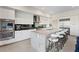 Modern kitchen with a large center island, sleek appliances, and ample cabinet space at 36 Lakefront Dr, Henderson, NV 89011