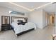 Well-lit main bedroom featuring a comfortable bed, stylish decor, and contemporary design at 36 Lakefront Dr, Henderson, NV 89011