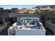 Stunning rooftop deck offering panoramic views and cozy seating arrangements at 36 Lakefront Dr, Henderson, NV 89011