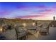 Charming rooftop deck with comfortable seating and scenic views of the surrounding landscape at 36 Lakefront Dr, Henderson, NV 89011