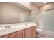 Bright bathroom with double sink vanity, shower/tub combination and neutral finishes at 3636 Chelsea Gardens Dr, Las Vegas, NV 89135