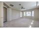 Large main bedroom with a ceiling fan, bay windows, and a private entry, offering a comfortable and relaxing space at 3636 Chelsea Gardens Dr, Las Vegas, NV 89135